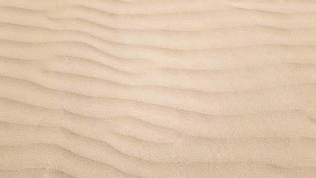 ベージュの砂